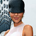 Hot to trot! Pip Edwards nails the brief in a Ford Millinery riding helmet and a voluminous ruffled Mariam Seddiq gown - paired with Jimmy Choo boots, of course!