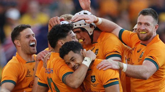 The Wallabies celebrate their win in Adelaide.