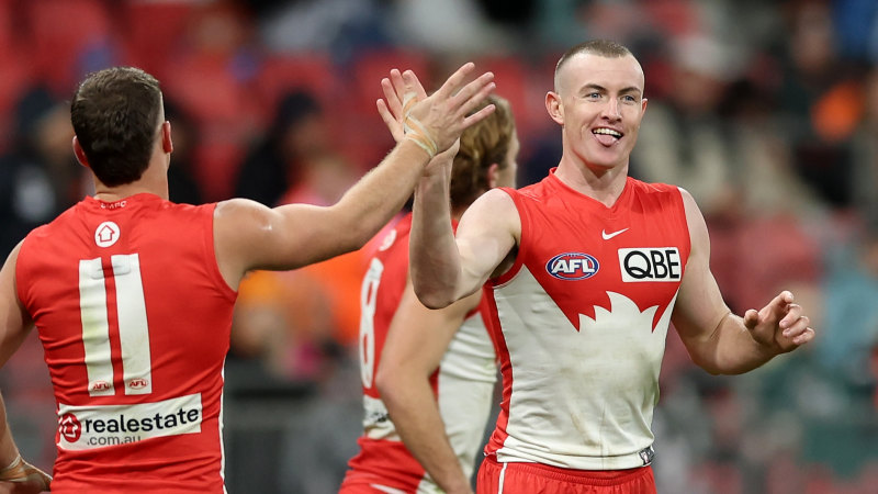 Swans storm to victory in the rain after dominating Giants in Sydney derby