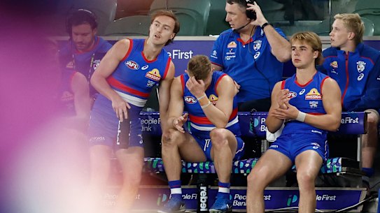 Treloar laments another calf injury on the bench.