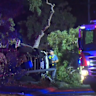 Hundreds of homes were left without power for more than 12 hours after a car crashed into a power pole, leaving two people in intensive care. 