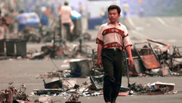 A Jakarta man in the debris-littered streets on May 16, 1998.