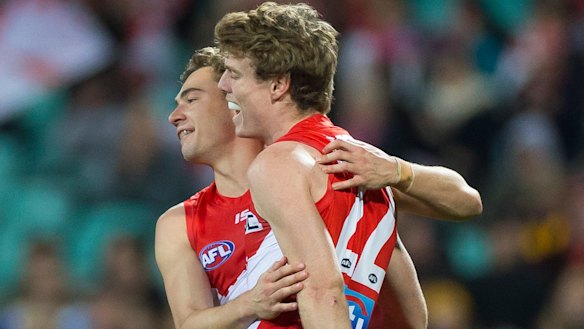 Nick Blakey celebrates after kicking a goal against Hawthorn.