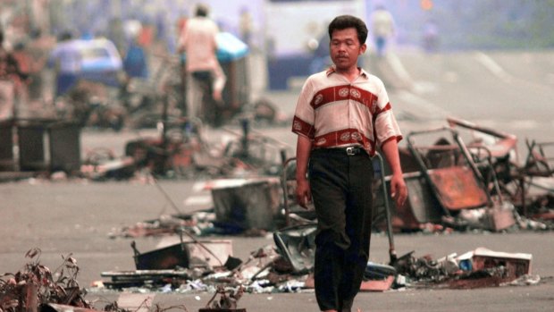 A Jakarta man in the debris-littered streets on May 16, 1998.