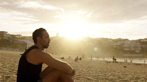 Adam Goodes in a reflective moment in The Australian Dream. 