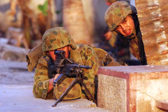 Australian troops securing the streets of Dili, September 1999.