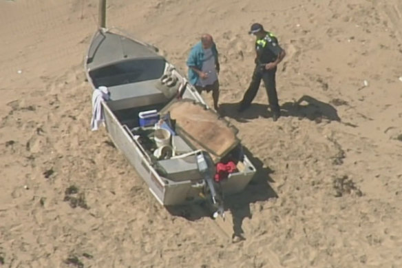 Rescue crews were called to an Anglesea beach after a small boat capsized just after 2pm on Saturday.