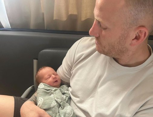 NSW Blues debutant Mitchell Barnett with newborn son Zane.