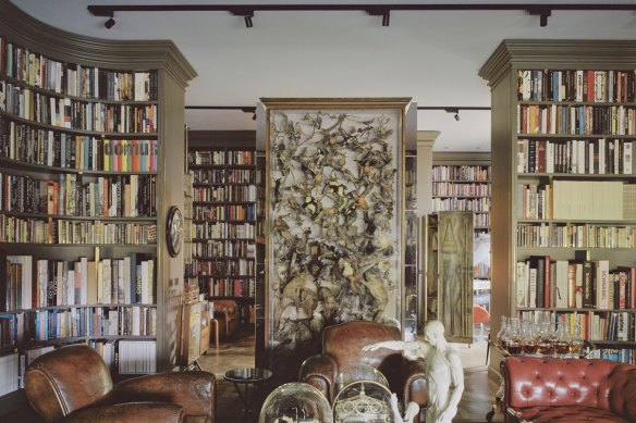 The residence has a wing dedicated to an elaborate study and library lined floor to ceiling with books.