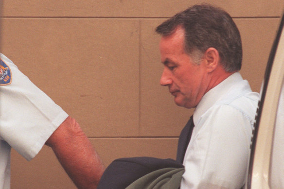 Ivan Milat being led away on April 11, 1996.