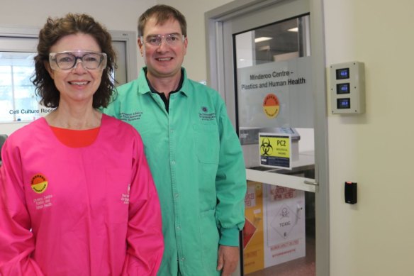 Sarah Dunlop and Kevin Thomas in front of the Minderoo Center – Plastics and Human Health research facility at the University of Queensland.