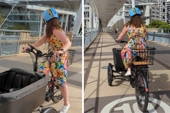 The author rolls slowly down the Kurilpa Bridge on an electric cargo trike, trying to keep under 10km/h.