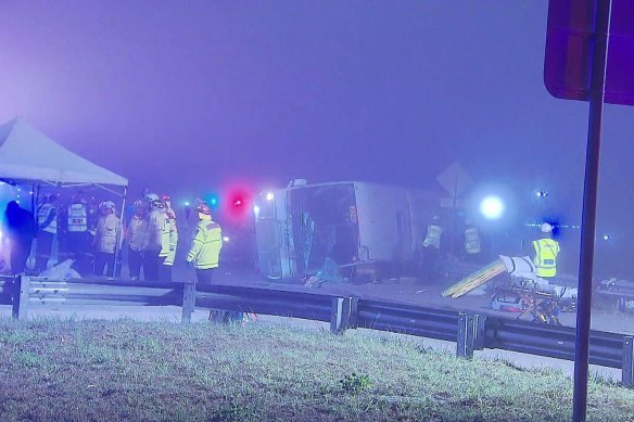 First responders at the scene of the bus crash in the early hours of Monday morning.