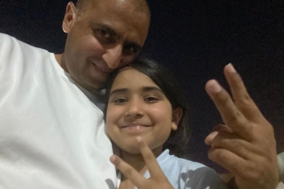 Hania Ahmad, 9, and her father, Adeel Ahmad. 