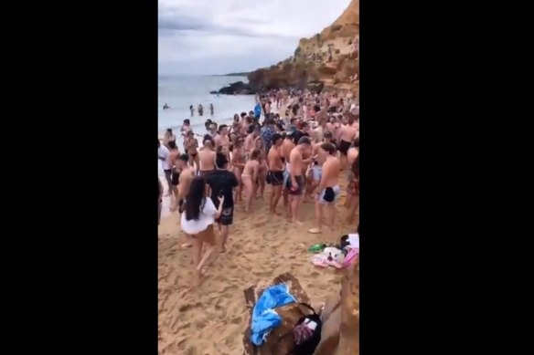 Dozens of young people partied at Black Rock on Sunday, breaching COVID-19 restrictions.