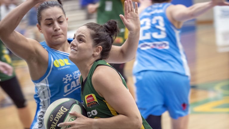 Sights set: Rangers guard Amelia Todhunter forces her way to the basket against the Capitals 