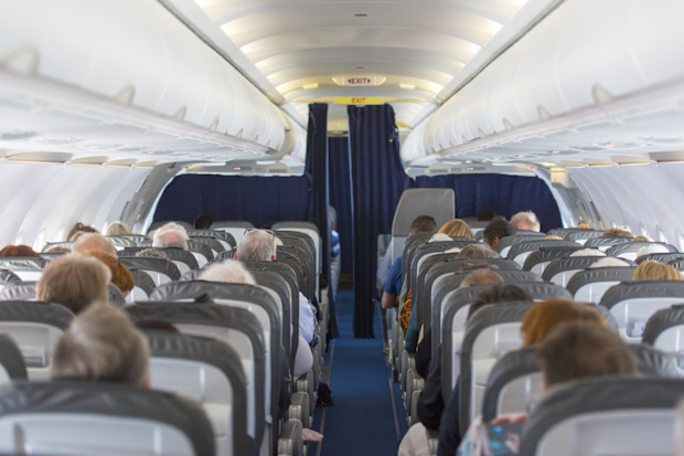 Packed plane / flight cabin
