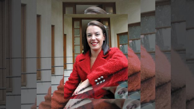 Melissa Caddick in her trademark red.