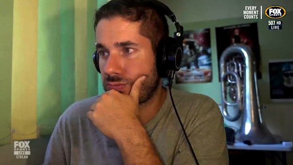 W-League viewers were left baffled when the broadcast of the Adelaide-Melbourne Victory game suddenly cut to webcam footage of a mystery man at a computer, with a brass instrument in the background.