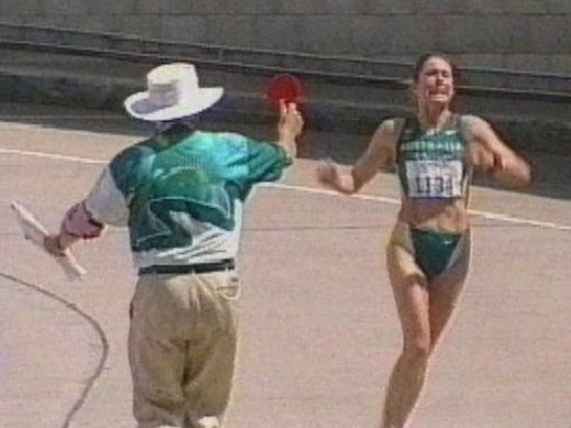 Lamberto Vacchi shows Jane Saville a red card at the Sydney Olympics.