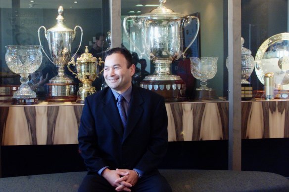 Eddie Jones in front of the trophy cabinet at Australian Rugby Union headquarters in North Sydney in 2001. 