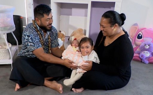Baby Miracle and family.