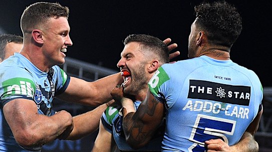 Big Ted: James Tedesco and the Blues celebrate a stunning victory.