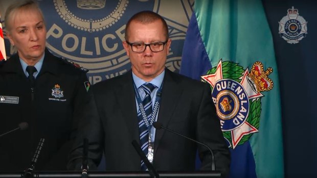 Detective Superintendent Craig Morrow, with Commissioner Katarina Carroll, speaks at a press conference after the death of Senior Constable Masters.