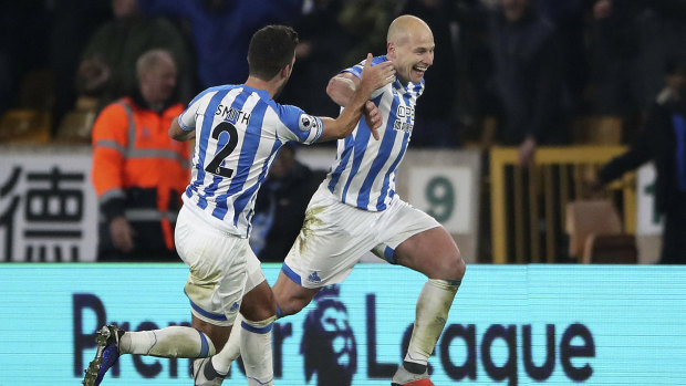 Huddersfield's Aaron Mooy celebrates scoring his second goal against Wolves.