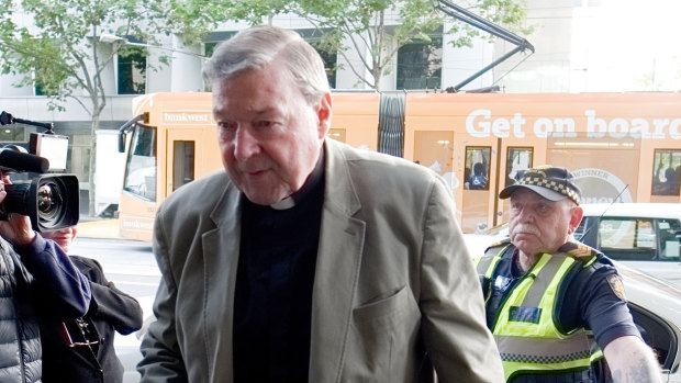 Cardinal George Pell arrives at Melbourne Magistrates Court on Tuesday.