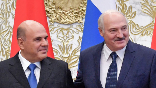 Belarusian President Alexander Lukashenko, right, and Russian Prime Minister Mikhail Mishustin discussed the refinancing of a loan in Minsk on Thursday.