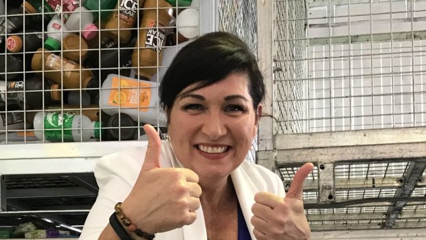 Environment Minister Leeanne Enoch gives Queenslanders the thumbs up in November 2019, when the state surpassed 1 billion recycled containers.