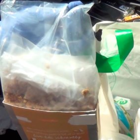 Police allege they found dangerous drugs hidden inside some granola.