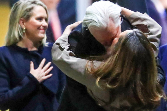 Lawyer Jennifer Robinson watches on as Julian Assange is greeted by his wife Stella upon his return to Australia last week.