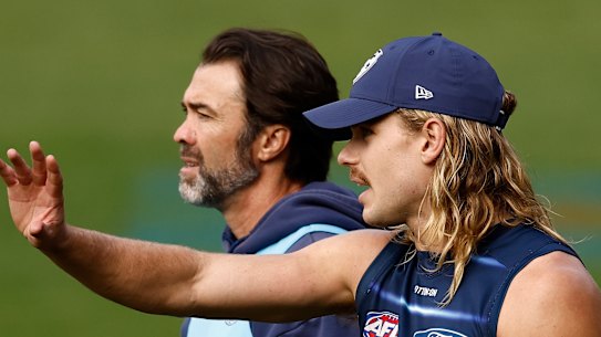 That’s where September is: Geelong coach Chris Scott with his star onballer Bailey Smith.