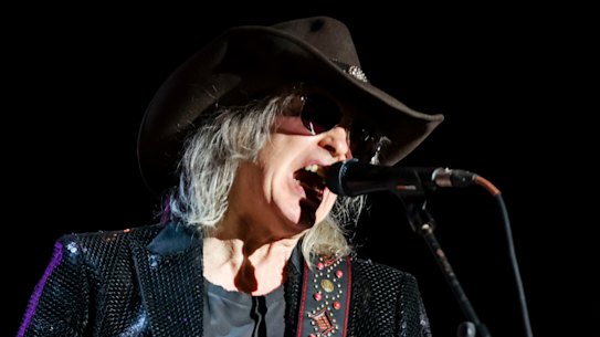 The singer, songwriter, and musician Mike Scott from The Waterboys  performing in 2024. 