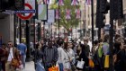 Shoppers on Oxford Street in London. Britain’s inflation rate has remained much stronger than expected.