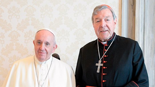 Pope Francis and Cardinal George Pell during their private meeting at the Vatican on Monday.