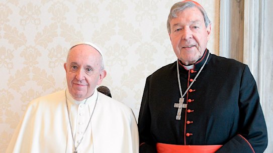 Pope Francis and Cardinal George Pell during their private meeting at the Vatican on Monday.