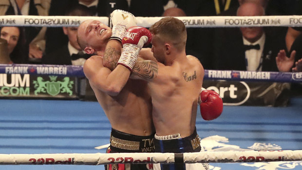 Outclassed: Carl Frampton (right) in action against Aussie Luke Jackson during their WBO Interim Featherweight title fight.