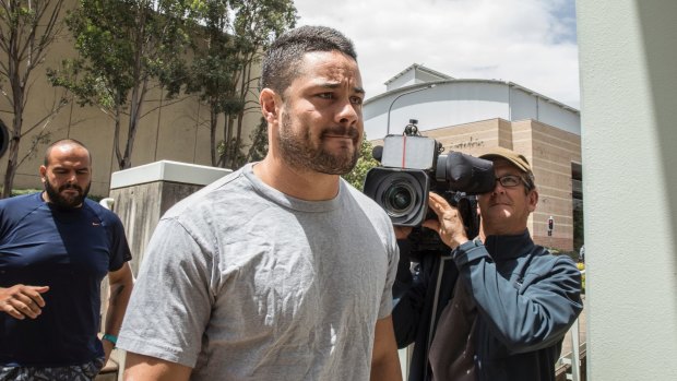 How the mighty have fallen: Jarryd Hayne reports to Castle Hill police station.
