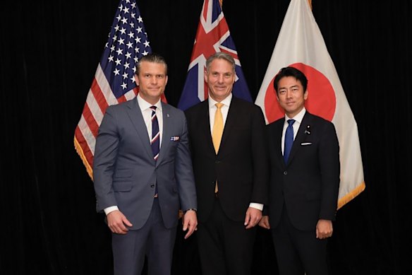 Defence Minister Richard Marles (centre) with US Defence Secretary Pete Hegseth and Japanese Defence Minister Shinjirō Koizumi in Singapore last month.