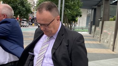 Glen Richard Prentice leaves Brisbane Magistrates Court on Friday.