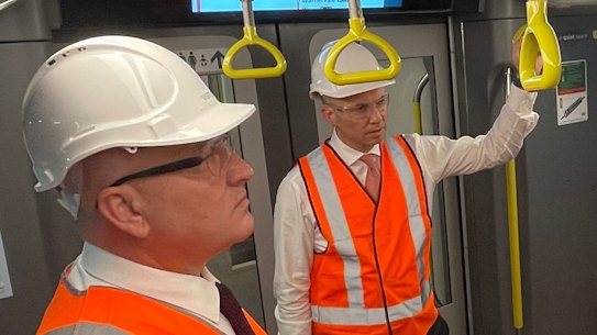 Hold on ... NSW Transport Minister David Elliott and Treasurer Matt Kean, bitter Liberal rivals.