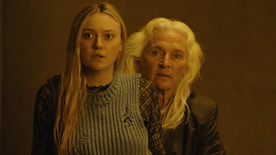 Dakota Fanning stars as Mina, who becomes lost in the woods, where she meets Madeline (Olwen Fouere).
