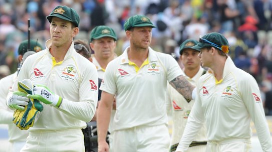Australia's captain Tim Paine leads his side to the pavilion.