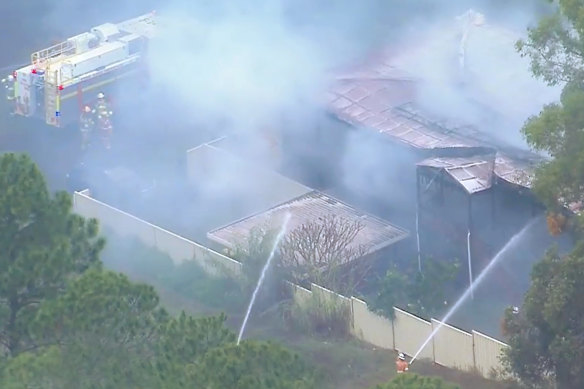 Fire crews battled the large blaze that engulfed multiple homes on Russell Island, in Brisbane’s south-east.