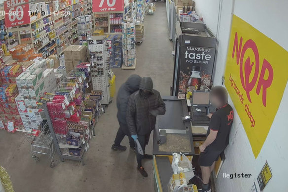 Basa, right, was captured on CCTV during the robbery at NQR.