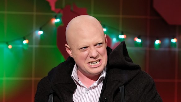 Tosh Greenslade as Brion Pegmatite speaks for a prominent Australian politician in <i>Mad As Hell<i>.