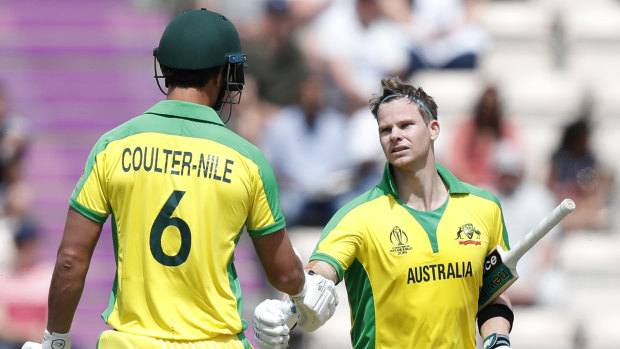 Nathan Coulter-Nile congratulates the former skipper on reaching triple figures.